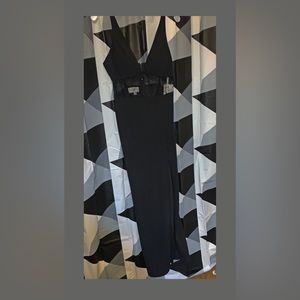 Long black dress with mesh on mid waist.